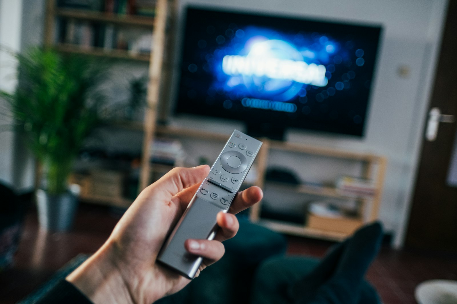 Watching live sports on a TV and phone at home